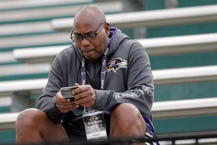 Newsome cultivates a personal touch with his players and is a common sight at Ravens practices. (Patrick Semansky/AP)